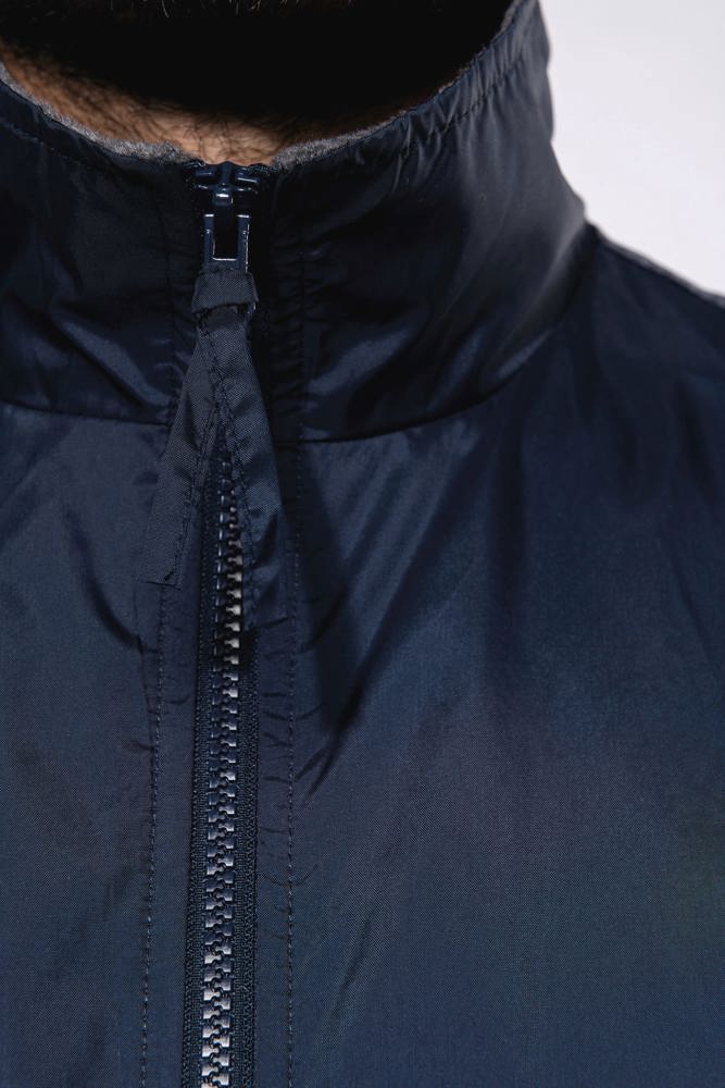 K679 - Met fleece gevoerde bodywarmer unisex